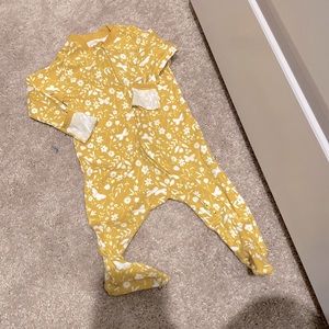 Old navy onesie size 3-6 months color gold with flowers